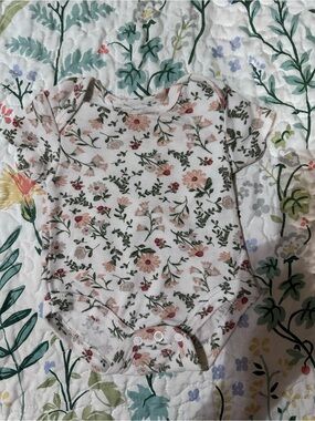 Baby Essentials Cream Floral One-Piece Bodysuit with Pink & Green Accents